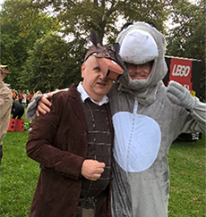 Neil at a charity walk with a gentleman he supports