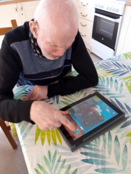 Giles enjoying his new tablet