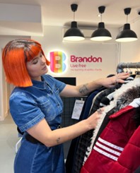 Clothemod aka Meg, hand selects clothes in a Brandon charity shop