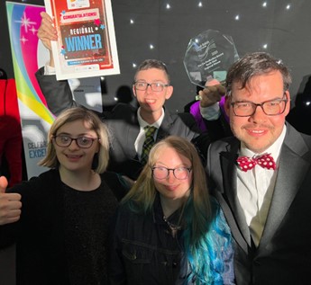 Brandon Adventurers Olivia, Lucy, Nathan and Tom celebrate winning the Co-production award